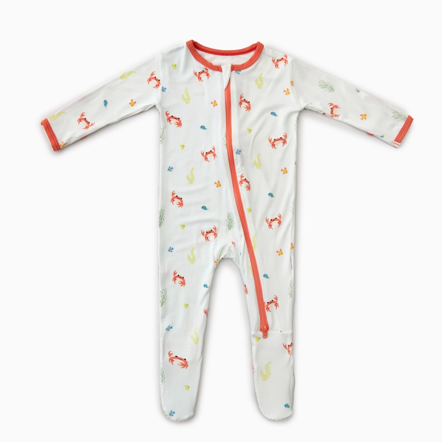 A multicolored bamboo baby footie with a crab pattern, featuring a zippered closure and fold-over mittens.