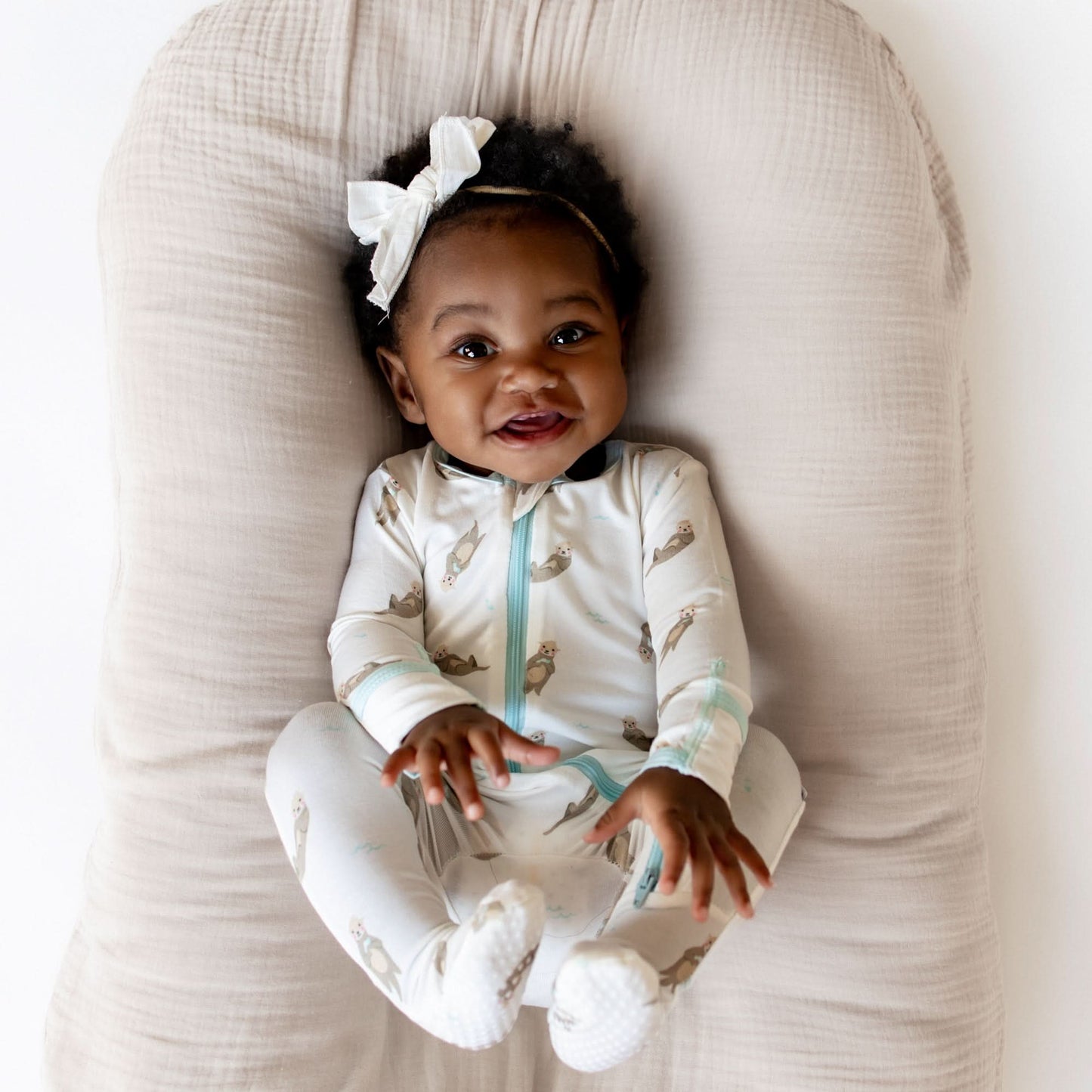 Otter Zippered Footie