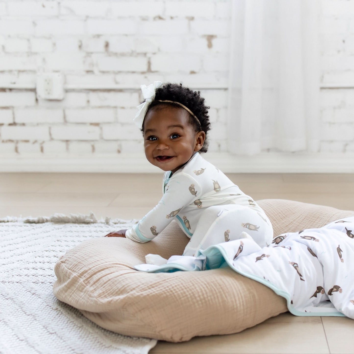 Otter Zippered Footie