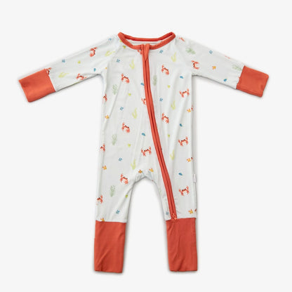 A multicolored baby romper with a pattern of crabs and other marine life, featuring fold-over mitts and foot cuffs, and matching zipper.
