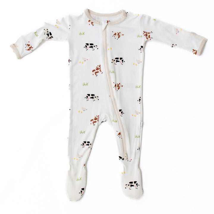 Soft bamboo baby footie with cow pattern, front view